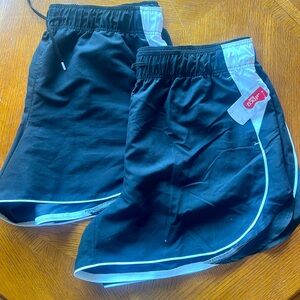 2 pack of BCG Black shorts with white trim.  Size 1X